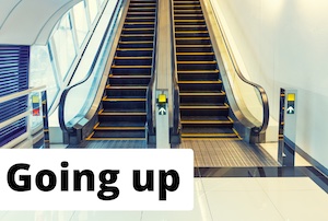 Image of escalators as a metaphor for higher interest rates