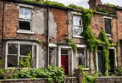 A row of British terraced houses in ruins